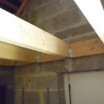 Construction d'un plancher en bois : poutre transversale