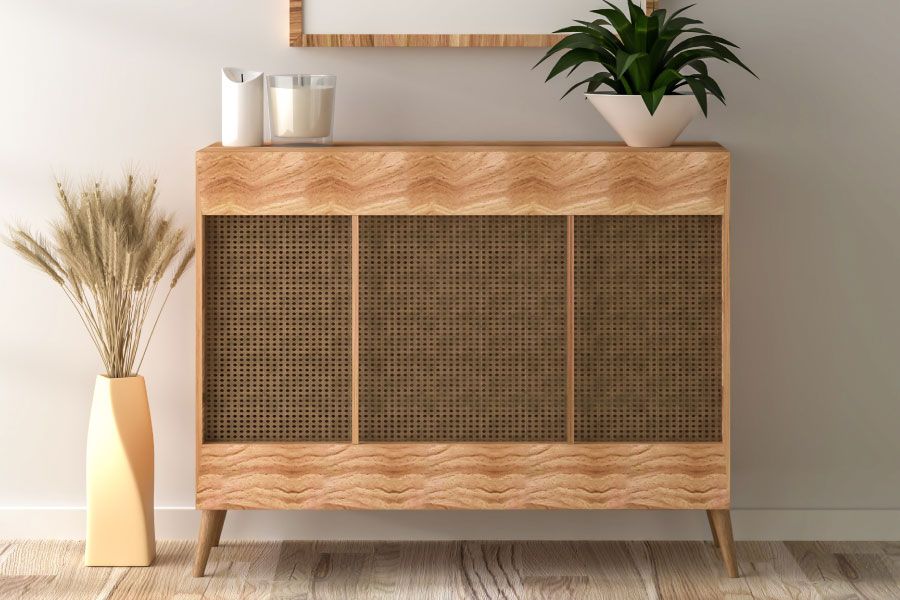 camouflage de radiateur avec un meuble et des portes en cannage